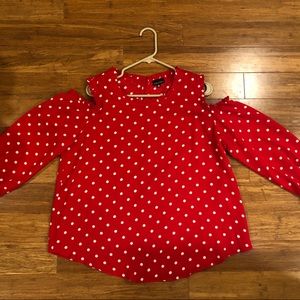 Red and white polka dot blouse